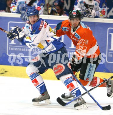 Eishockey Bundesliga. VSV gegen EC Graz 99ers. David Slivnik (VSV), Stefan Herzog (Graz). Villach, am 28.1.2007.
Foto: Kuess
---
pressefotos, pressefotografie, kuess, qs, qspictures, sport, bild, bilder, bilddatenbank