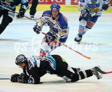 Eishockey Bundesliga. VSV gegen EHC Liwest Linz. Devin Edgerton (VSV), Mark Sz?cs (Linz). Villach, am 15.3.2007.
Foto: Kuess
---
pressefotos, pressefotografie, kuess, qs, qspictures, sport, bild, bilder, bilddatenbank