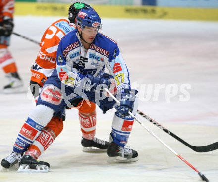 Eishockey Bundesliga. VSV gegen EC Graz 99ers. Marc Brown (VSV), Scott Crawford (Graz). Villach, am 28.1.2007.
Foto: Kuess
---
pressefotos, pressefotografie, kuess, qs, qspictures, sport, bild, bilder, bilddatenbank