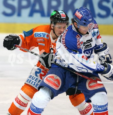 Eishockey Bundesliga. VSV gegen EC Graz 99ers. Gilbert K?hn (VSV), Tommy Jacobsen (Graz). Villach, am 28.1.2007.
Foto: Kuess
---
pressefotos, pressefotografie, kuess, qs, qspictures, sport, bild, bilder, bilddatenbank