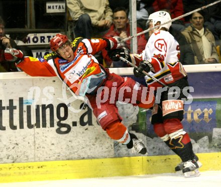 Eishockey Bundesliga. KAC gegen Jesenice. Chad Hinz (KAC), Damjan Dervaric (Jesenice). Klagenfurt, am 4.3.2007.
Foto: Kuess
---
pressefotos, pressefotografie, kuess, qs, qspictures, sport, bild, bilder, bilddatenbank