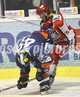 Eishockey Bundesliga. KAC gegen Graz 99ers. Jeremy Rebek (KAC), Greg Day (Graz). Klagenfurt, am 14.1.2007.
Foto: Kuess
---
pressefotos, pressefotografie, kuess, qs, qspictures, sport, bild, bilder, bilddatenbank