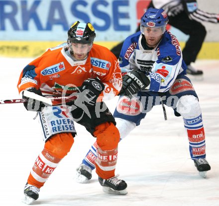 Eishockey Bundesliga. VSV gegen EC Graz 99ers. Daniel Gauthier (VSV), Greg Day (Graz). Villach, am 28.1.2007.
Foto: Kuess
---
pressefotos, pressefotografie, kuess, qs, qspictures, sport, bild, bilder, bilddatenbank