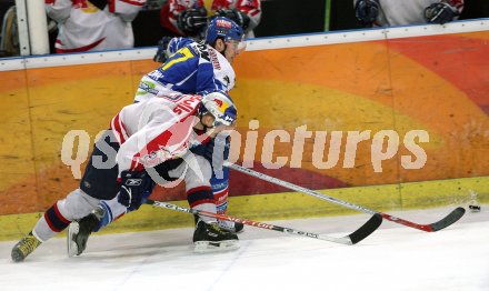 Eishockey Bundesliga. Red Bull Salzburg gegen VSV. Juha Lind (Salzburg), Marc Brown (VSV). Salzburg, am 5.4.2007.
Foto: Kuess
---
pressefotos, pressefotografie, kuess, qs, qspictures, sport, bild, bilder, bilddatenbank