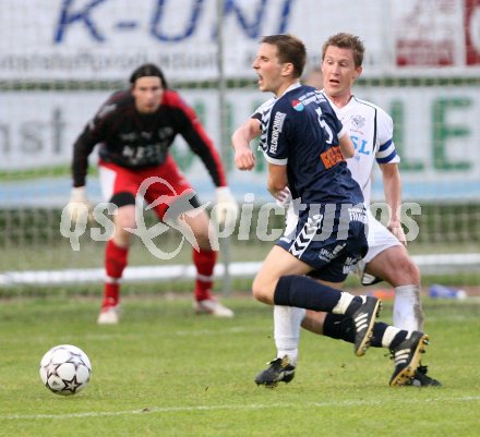 Fussball Regionalliga. Spittal gegen Feldkirchen. Claus Neidhardt (Spittal), Michael Rebernig (Feldkirchen). Spittal, am 5.6.2007.
Foto: Kuess
---
pressefotos, pressefotografie, kuess, qs, qspictures, sport, bild, bilder, bilddatenbank