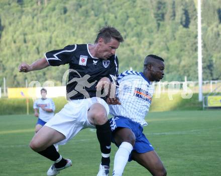 Fussball. Feldkirchen gegen SK Austria Kaernten.  Gernot Plassnegger  (Kaernten), Maxwell Siaw (Feldkirchen). Feldkirchen, am 19.6.2007.
Foto: Kuess
---
pressefotos, pressefotografie, kuess, qs, qspictures, sport, bild, bilder, bilddatenbank