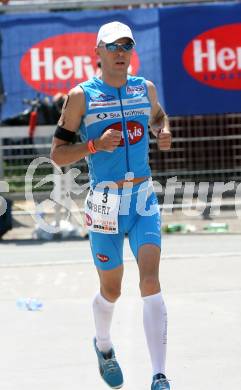 Ironman. Laufen, Schwimmen. Radfahren. Norbert Langbrandtner (Deutschland). Klagenfurt, am 8.7.2007.
Foto: Kuess
---
pressefotos, pressefotografie, kuess, qs, qspictures, sport, bild, bilder, bilddatenbank