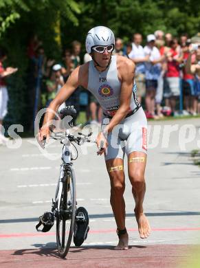 Ironman. Laufen, Schwimmen. Radfahren. Marino Vanhoenacker (Belgien). Klagenfurt, am 8.7.2007.
Foto: Kuess
---
pressefotos, pressefotografie, kuess, qs, qspictures, sport, bild, bilder, bilddatenbank