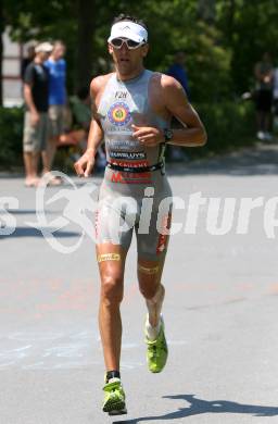 Ironman. Laufen, Schwimmen. Radfahren. Marino Vanhoenacker (Belgien). Klagenfurt, am 8.7.2007.
Foto: Kuess
---
pressefotos, pressefotografie, kuess, qs, qspictures, sport, bild, bilder, bilddatenbank