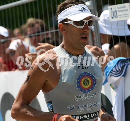 Ironman. Laufen, Schwimmen. Radfahren. Marino Vanhoenacker (Belgien). Klagenfurt, am 8.7.2007.
Foto: Kuess
---
pressefotos, pressefotografie, kuess, qs, qspictures, sport, bild, bilder, bilddatenbank