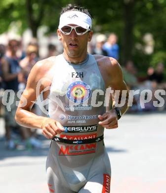 Ironman. Laufen, Schwimmen. Radfahren. Marino Vanhoenacker (Belgien). Klagenfurt, am 8.7.2007.
Foto: Kuess
---
pressefotos, pressefotografie, kuess, qs, qspictures, sport, bild, bilder, bilddatenbank