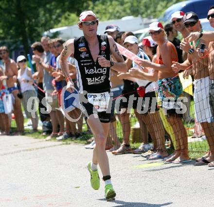 Ironman. Laufen, Schwimmen. Radfahren. Hannes Hempel (Oesterreich).  Klagenfurt, am 8.7.2007.
Foto: Kuess
---
pressefotos, pressefotografie, kuess, qs, qspictures, sport, bild, bilder, bilddatenbank