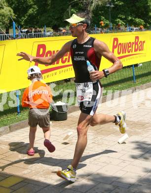 Ironman. Laufen, Schwimmen. Radfahren. Max Renko (Oesterreich). Klagenfurt, am 8.7.2007.
Foto: Kuess
---
pressefotos, pressefotografie, kuess, qs, qspictures, sport, bild, bilder, bilddatenbank