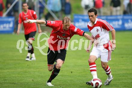 Fussball Bundesliga. Testspiel Hannover 96 gegen 1. FC Koeln. Jan Rosenthal (Hannover), Andre (Koeln). Velden, am 24.7.2007.
Foto: Kuess
---
pressefotos, pressefotografie, kuess, qs, qspictures, sport, bild, bilder, bilddatenbank