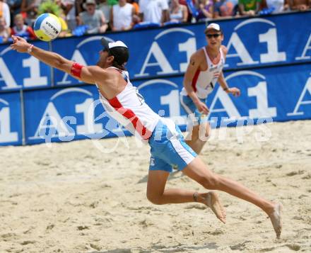 Beachvolleyball. Grand Slam. Doppler Clemens, Gartmayer Peter (Oesterreich). Klagenfurt, am 4.8.2007.
Foto: Kuess
---
pressefotos, pressefotografie, kuess, qs, qspictures, sport, bild, bilder, bilddatenbank