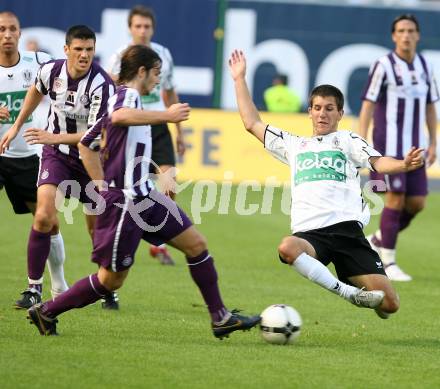 Fussball Bundesliga. SK Austria Kelag Kaernten gegen FK Austria Magna. Sandro Zakany (Austria Kaernten), Emin Sulimani (Austria Magna). Klagenfurt, am 15.9.2007.
Foto: Kuess
---
pressefotos, pressefotografie, kuess, qs, qspictures, sport, bild, bilder, bilddatenbank