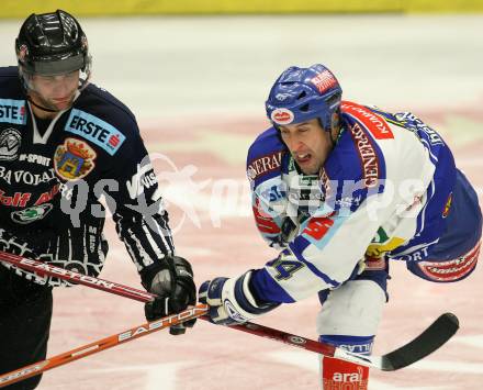 Erste Bank Eishockey Bundesliga. VSV gegen Alba Volan Fetiva. Dany Bousquet (VSV), Michal Dostal (Alba Volan). Villach, am 27.9.2007.
Foto: Kuess
---
pressefotos, pressefotografie, kuess, qs, qspictures, sport, bild, bilder, bilddatenbank