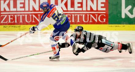 Erste Bank Eishockey Bundesliga. VSV gegen Graz 99ers. Dany Bousquet (VSV), Nick Martens (Graz). Villach, am 30.9.2007.
Foto: Kuess 
---
pressefotos, pressefotografie, kuess, qs, qspictures, sport, bild, bilder, bilddatenbank