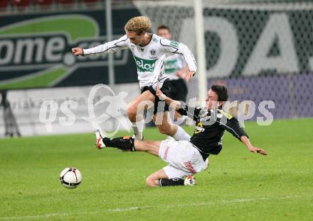 Fussball Bundesliga. T-Mobile. SK Austria Kaernten gegenCashpoint SCR Altach. Lukas Moessner (Kaernten), Enrico Pfister (Altach). Klagenfurt, am 31.10.2007.
---
pressefotos, pressefotografie, kuess, qs, qspictures, sport, bild, bilder, bilddatenbank