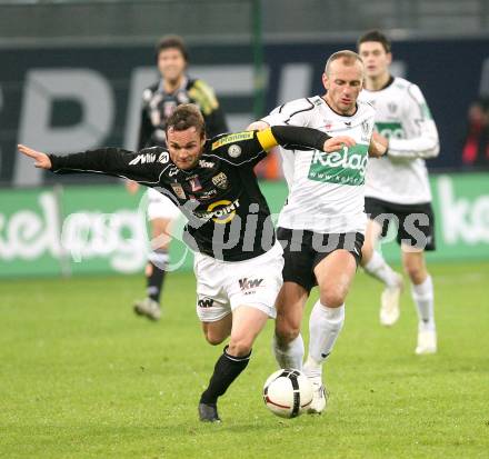 Fussball Bundesliga. T-Mobile. SK Austria Kaernten gegen Cashpoint SCR Altach. Adam Ledwon (Kaernten), Kai Schoppitsch (Altach). Klagenfurt, am 31.10.2007.
Foto: Kuess
---
pressefotos, pressefotografie, kuess, qs, qspictures, sport, bild, bilder, bilddatenbank