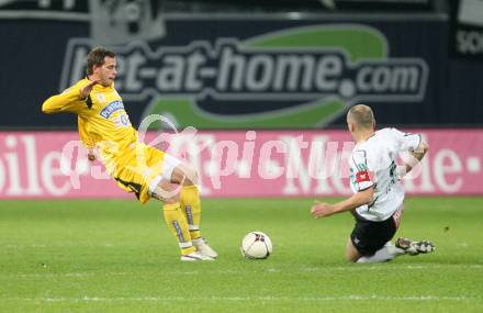 Fussball Bundesliga. T-Mobile. SK Austria Kaernten gegen SK Puntigamer Sturm Graz. Adam Ledwon (Kaernten), Juergen Saeumel (Sturm). Klagenfurt, am 3.11.2007.
Foto: Kuess
---
pressefotos, pressefotografie, kuess, qs, qspictures, sport, bild, bilder, bilddatenbank