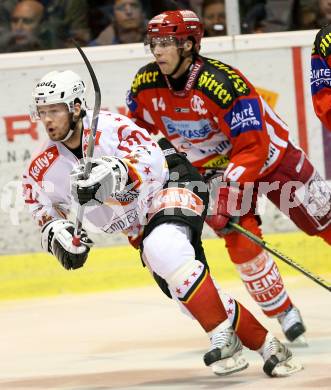 EBEL Erste Bank Eishockey Bundesliga. KAC gegen HK Acroni Jesenice. Johannes Reichel (KAC), Andrej Hebar (Jesenice). Klagenfurt, am 4.11.2007.
Foto: Kuess
---
pressefotos, pressefotografie, kuess, qs, qspictures, sport, bild, bilder, bilddatenbank