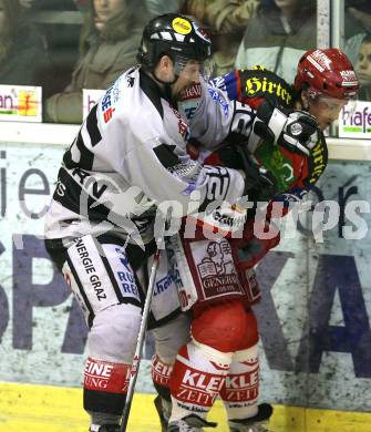 EBEL. Erste Bank Eishockey Bundesliga. KAC gegen EHC Graz 99ers. Christoph Harand  (KAC), Steve Washburn (Graz). Klagenfurt, am 2.12.2007.
Foto: Kuess
---
pressefotos, pressefotografie, kuess, qs, qspictures, sport, bild, bilder, bilddatenbank