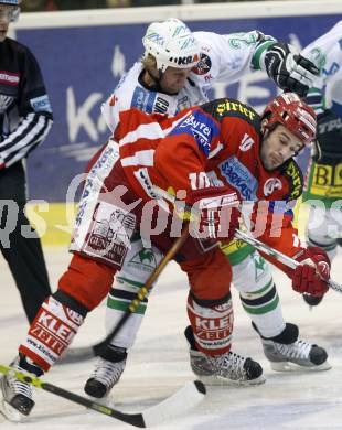 EBEL. Eishockey Bundesliga. KAC gegen Olympia Ljubljana (Laibach). Warren Norris (KAC), Tomaz Vnuk (Laibach). Klagenfurt, am 14.2.2008.
Foto: Kuess
---
pressefotos, pressefotografie, kuess, qs, qspictures, sport, bild, bilder, bilddatenbank