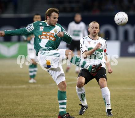 Fussball. T-Mobile Bundesliga. SK Austria Kaernten gegen SK Rapid Wien. Adam Ledwon (Kaernten), Markus Heikkinen (Rapid). Klagenfurt, am 16.2.2008.
Foto: Kuess
---
pressefotos, pressefotografie, kuess, qs, qspictures, sport, bild, bilder, bilddatenbank