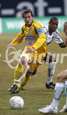 Fussball T-Mobile Bundesliga. SK Austria Kaernten gegen Sturm Graz. Alexandre Chiquinho Da Silva (Kaernten), Juergen Saeumel (Sturm). Klagenfurt, am 26.2.2008.

Copyright Kuess

---
pressefotos, pressefotografie, kuess, qs, qspictures, sport, bild, bilder, bilddatenbank