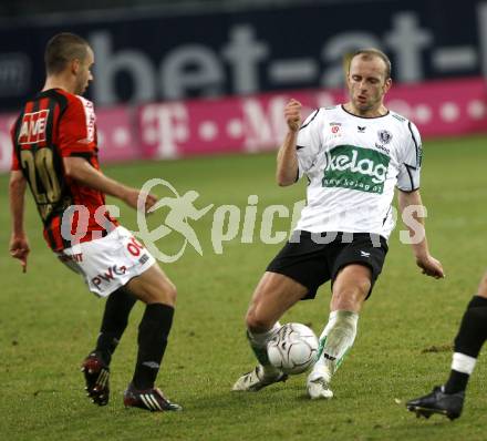 Fussball. Bundesliga. SK Austria Kelag Kaernten gegen LASK Linz.  Ledwon Adam (Kaernten), Saurer Christoph (LASK). Klagenfurt, 29.3.2008
Copyright Kuess

---
pressefotos, pressefotografie, kuess, qs, qspictures, sport, bild, bilder, bilddatenbank