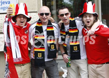 Fussball Europameisterschaft. EURO 2008. Polnische und deutsche Fans Fans. Klagenfurt, am 7.6.2008.
Foto: Kuess
---
pressefotos, pressefotografie, kuess, qs, qspictures, sport, bild, bilder, bilddatenbank