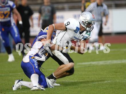 American Football. Austrian Bowl. Finale. Turek Graz Giants gegen Swarco Raiders Tirol. Mohamed Muheize (Giants), Ryan Voss (Raiders).Wolfsberg, 27.6.2008.
Copyright: Kuess
Copyright Kuess

---
pressefotos, pressefotografie, kuess, qs, qspictures, sport, bild, bilder, bilddatenbank