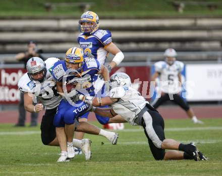 American Football. Austrian Bowl. Finale. Turek Graz Giants gegen Swarco Raiders Tirol. Wolfrum Hofbauer (Giants), Christian Schober (Raiders).Wolfsberg, 27.6.2008.
Copyright: Kuess
Copyright Kuess

---
pressefotos, pressefotografie, kuess, qs, qspictures, sport, bild, bilder, bilddatenbank