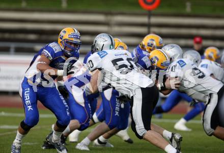 American Football. Austrian Bowl. Finale. Turek Graz Giants gegen Swarco Raiders Tirol. Oberbichler Guido (Giants),  Mario Rinner (Raiders).Wolfsberg, 27.6.2008.
Copyright: Kuess
Copyright Kuess

---
pressefotos, pressefotografie, kuess, qs, qspictures, sport, bild, bilder, bilddatenbank