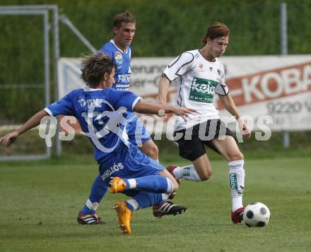 Fussball Testspiel. SK Austria Kaernten gegen MTK Budapest. Marco Miesenboeck (Kaernten), Laszlo Zsidai (Budapest). Velden, am 12.7.2008.
Foto: Kuess




---
pressefotos, pressefotografie, kuess, qs, qspictures, sport, bild, bilder, bilddatenbank