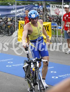 Ironman Austria. Schwimmen, Radfahren, Laufen. Charly Loisel (FRA). Klagenfurt, am 13.7.2008.
Copyright Kuess

---
pressefotos, pressefotografie, kuess, qs, qspictures, sport, bild, bilder, bilddatenbank