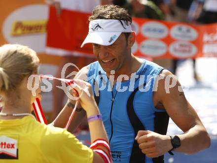 Ironman Austria. Schwimmen, Radfahren, Laufen. Christian Tammegger (AUT). Klagenfurt, am 13.7.2008.
Foto: Kuess
---
pressefotos, pressefotografie, kuess, qs, qspictures, sport, bild, bilder, bilddatenbank