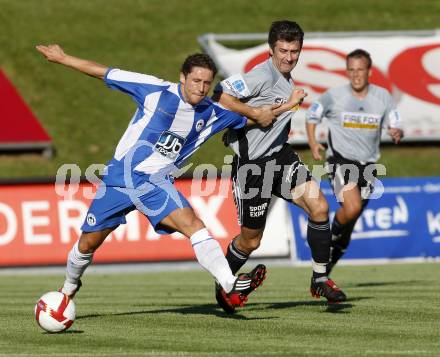 Fussball. Testspiel. FC St. Veit gegen Wigan Athletic. Michael Brown (Wigan), Branko Puljic (St.Veit) . St. Veit, 19.7.2008
Copyright Kuess

---
pressefotos, pressefotografie, kuess, qs, qspictures, sport, bild, bilder, bilddatenbank