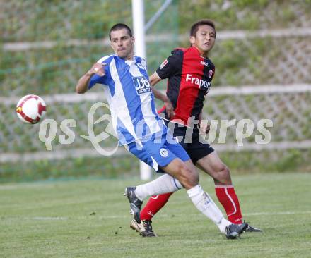 Fussball. Testspiel. Eintrach Frankfurt gegen Wigan Athletic. Junichi Inamoto (Eintracht), Paul Scharner (Wigan). Bad Bleiberg, am 22.7.2008
Copyright Kuess

---
pressefotos, pressefotografie, kuess, qs, qspictures, sport, bild, bilder, bilddatenbank