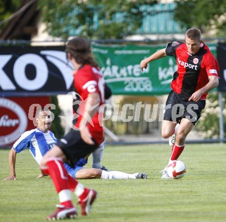 Fussball. Testspiel. Eintrach Frankfurt gegen Wigan Athletic. Alexander Meier (Eintracht), Paul Scharner (Wigan). Bad Bleiberg, am 22.7.2008
Copyright Kuess

---
pressefotos, pressefotografie, kuess, qs, qspictures, sport, bild, bilder, bilddatenbank