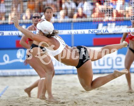 Beach Volleyball. Grand Slam 2008. MONTAGNOLLI Sara, PICHLER Kerstin (AUT). Klagenfurt, 30.7.2008.
Copyright Kuess

---
pressefotos, pressefotografie, kuess, qs, qspictures, sport, bild, bilder, bilddatenbank