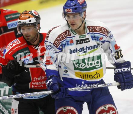 EBEL.  Eishockey Bundesliga. EC Pasut VSV gegen HC TWK Innsbruck. Jonathan Ferland (VSV), Gerhard Unterluggauer (Innsbruck). Villach, am 30.9.2008.
Foto: Kuess

---
pressefotos, pressefotografie, kuess, qs, qspictures, sport, bild, bilder, bilddatenbank
