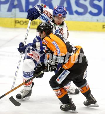 EBEL. Eishockey Bundesliga. VSV gegen Graz. Thomas Pfeffer (VSV), Daniel Schildorfer (Graz). Klagenfurt, am 21.10.2008.
Foto: Kuess 
---
pressefotos, pressefotografie, kuess, qs, qspictures, sport, bild, bilder, bilddatenbank