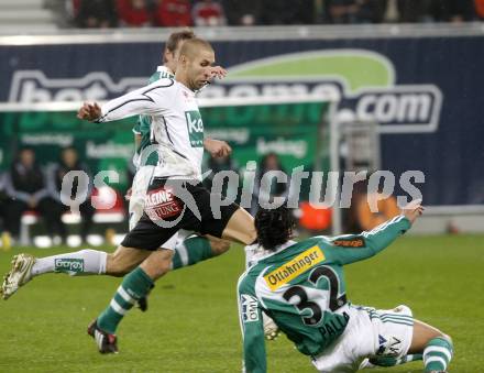 Fussball. Tipp3-Bundesliga. SK Austria Kelag Kaernten  gegen Rapid Wien. Patrick Wolf (Austria Kaernten), Stephan Palla (Rapid). Klagenfurt, 4.11.2008. 
Copyright Kuess

---
pressefotos, pressefotografie, kuess, qs, qspictures, sport, bild, bilder, bilddatenbank