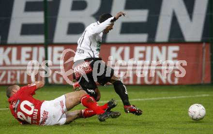 Fussball. Tipp3-Bundesliga. SK Austria Kelag Kaernten  gegen Cashpoint SCR Altach.   Da Silva Sandro Jose   (Austria Kaernten), Moedim Junior Jose Elias  (Altach). Klagenfurt, 12.11.2008. 
Copyright Kuess

---
pressefotos, pressefotografie, kuess, qs, qspictures, sport, bild, bilder, bilddatenbank