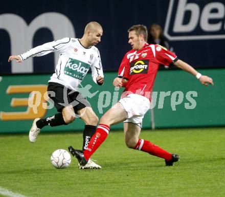 Fussball. Tipp3-Bundesliga. SK Austria Kelag Kaernten  gegen Cashpoint SCR Altach. Wolf Patrick (Austria Kaernten), Mattle Oliver (Altach). Klagenfurt, 12.11.2008. 
Copyright Kuess

---
pressefotos, pressefotografie, kuess, qs, qspictures, sport, bild, bilder, bilddatenbank