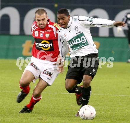 Fussball. Tipp3-Bundesliga. SK Austria Kelag Kaernten  gegen Cashpoint SCR Altach.   Da Silva Sandro Jose (Austria Kaernten), Moedim Junior Jose Elias (Altach). Klagenfurt, 12.11.2008. 
Copyright Kuess

---
pressefotos, pressefotografie, kuess, qs, qspictures, sport, bild, bilder, bilddatenbank