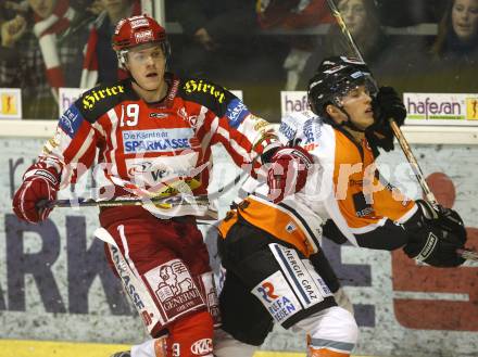 EBEL. Eishockey Bundesliga. KAC gegen  EC GRAZ 99ers. Stefan Geier (KAC), Florian Dinhopel (Graz). Klagenfurt, am 16.11.2008.
Foto: Kuess 

---
pressefotos, pressefotografie, kuess, qs, qspictures, sport, bild, bilder, bilddatenbank