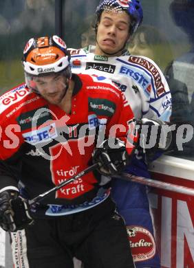 EBEL. Eishockey Bundesliga. EC Pasut VSV gegen HC TWK Innsbruck "Die Haie". Thomas Raffl, (VSV),  Philippe Lakos (Innsbruck). Villach, am 25.11.2008.
Foto: Kuess 

---
pressefotos, pressefotografie, kuess, qs, qspictures, sport, bild, bilder, bilddatenbank